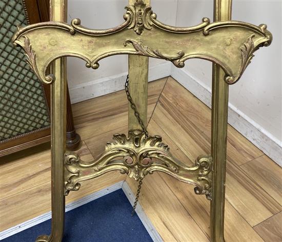 A Louis XV style giltwood picture easel, height 196cm